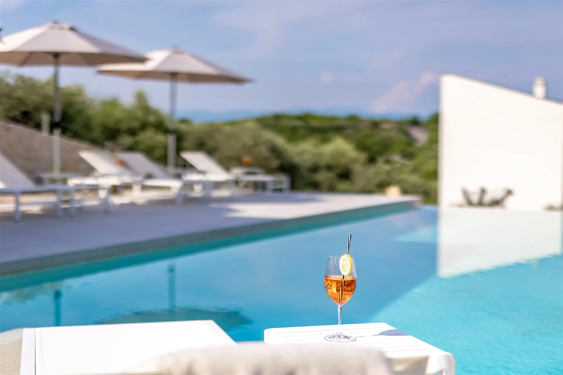 Afternoon by the Villa Manatis pool with Aperol and sea view